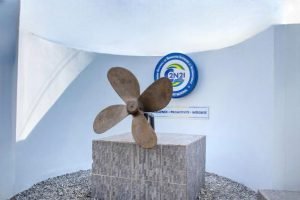 Logo de la Société Nationale de Navigation Maritime.